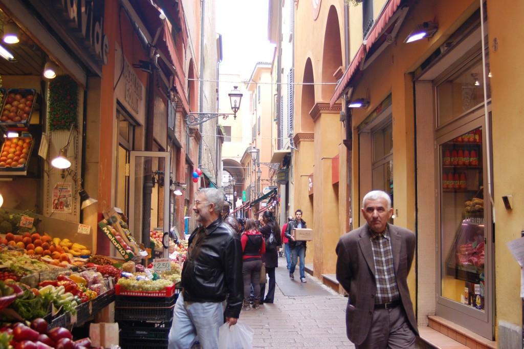 Residents shopping in  Bologna Food Alley, Bologna Italy 