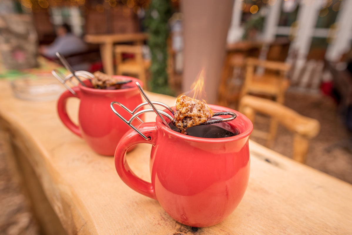 Feuerzangentasse, German Glühwein served with a flaming cone of sugar!