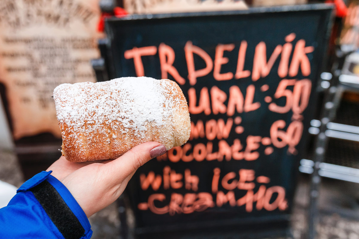 Woman holding trdelnik food bucket list