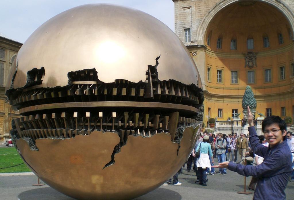 Traveler Measuring Globe in Vatican Courtyard, the Vatican, Rome 